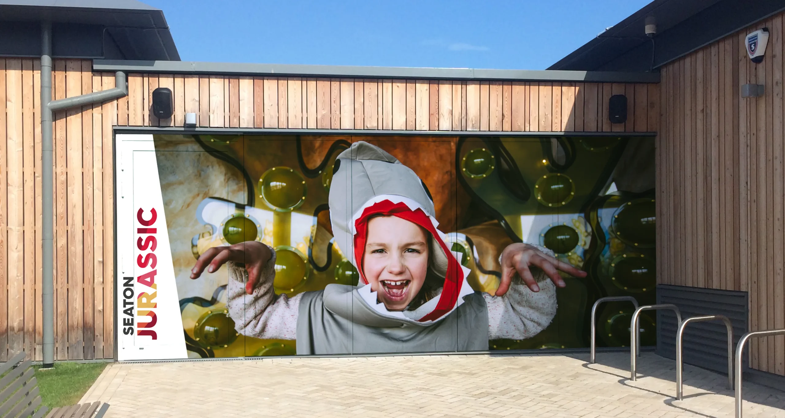 Seaton metal doors with print graphics on to make them look interesting